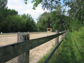 Dressage ring with judging booth - fence view